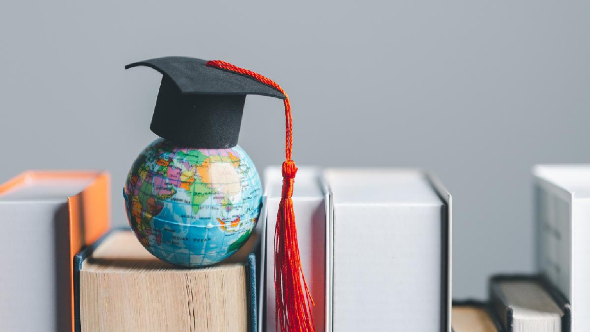 World globe with cap promoting Australia study